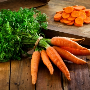 Carrots whole with green top and cut up
